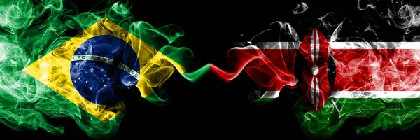 Бразилія проти Кенії, кенійського диму прапори поміщені пліч-о-пліч. Товсті кольорові Шовковистий дим прапори бразильського і Кенії, кенійських — стокове фото