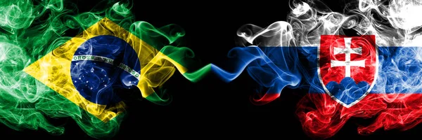 Brazil vs Slovakia, Slovakian smoke flags placed side by side. Thick colored silky smoke flags of Brazilian and Slovakia, Slovakian — Stock Photo, Image