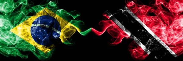 Brazil vs Trinidad and Tobago smoke flags placed side by side. Thick colored silky smoke flags of Brazilian and Trinidad and Tobago — Stock Photo, Image