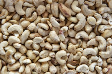 Kavrulmuş kaju fıstığı, doku ve arka plan. Üst görünüm.