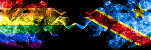 Gay vs Democratic Republic of the Congo smoke flags placed side by side. Thick colored silky smoke flags of Pride and Democratic Republic of the Congo — Stock Photo, Image