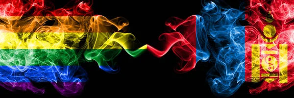 Gay vs Mongolia, Mongolian smoke flags placed side by side. Thick colored silky smoke flags of Pride and Mongolia, Mongolian — Stock Photo, Image