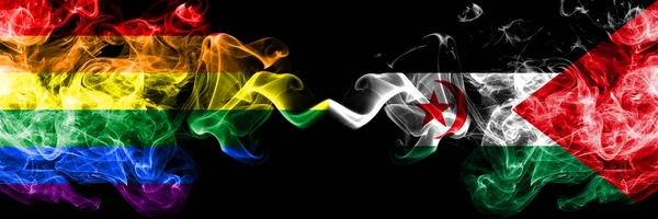 Bandeiras de fumaça gay vs sarauí colocadas lado a lado. Bandeiras de fumo sedoso de cor grossa de Pride e Sahrawi — Fotografia de Stock