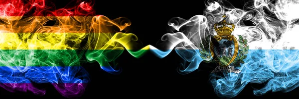 Gay vs san marino, sammarinesische Rauchfahnen nebeneinander platziert. dicke, seidige Rauchfahnen von Stolz und San Marino, sammarinesisch — Stockfoto
