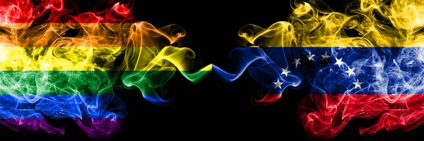 Gay vs Venezuela, Venezuelan smoke flags placed side by side. Thick colored silky smoke flags of Pride and Venezuela, Venezuelan — Stock Photo, Image