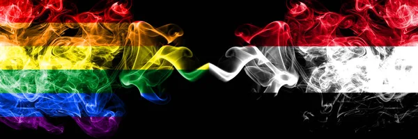 Gay vs Yemen, Yemeni smoke flags placed side by side. Thick colored silky smoke flags of Pride and Yemen, Yemeni — Stock Photo, Image