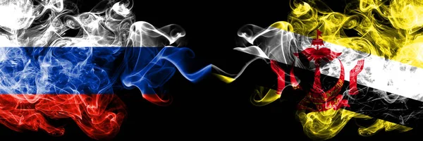 Russian vs Brunei, banderas de humo Bruneian colocadas una al lado de la otra. Banderas de humo sedoso de color grueso de Rusia y Brunéi, Brunéi —  Fotos de Stock