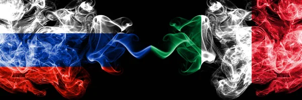 Russian vs Italy, Italian smoke flags placed side by side. Thick colored silky smoke flags of Russia and Italy, Italian — 스톡 사진