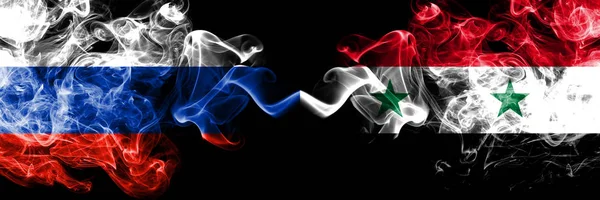 Russian vs Syria, Syrian smoke flags placed side by side. Thick colored silky smoke flags of Russia and Syria, Syrian — Stock Photo, Image