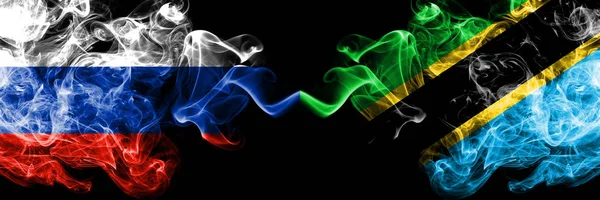 Rus, Tanzanya 'ya karşı, yan yana yerleştirilmiş Tanzanya dumanı bayrakları. Rusya ve Tanzanya 'nın kalın renkli dumanlı bayrakları, Tanzanya — Stok fotoğraf