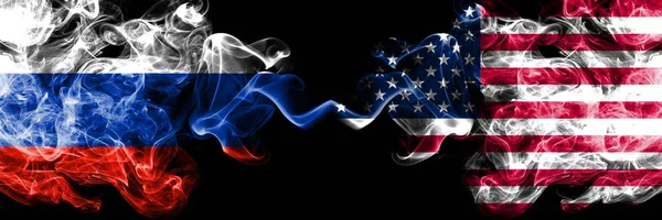 Russian vs United States of America, American smoke flags placed side by side. Thick colored silky smoke flags of Russia and United States of America, American — Stock Photo, Image