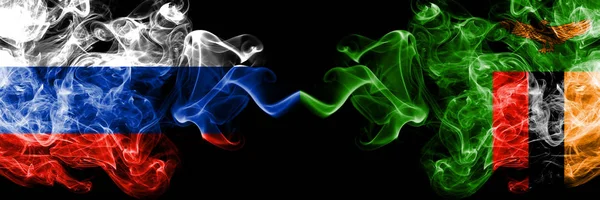 Rusia vs Zambia, banderas de humo de Zambia colocadas una al lado de la otra. Banderas de humo sedoso de color grueso de Rusia y Zambia, Zambia — Foto de Stock