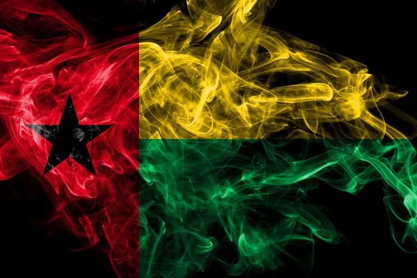 Gwinea Bissau dym flag izolowane na czarnym tle — Zdjęcie stockowe