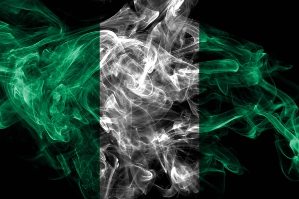 Nigéria fumaça bandeira isolada no fundo preto — Fotografia de Stock