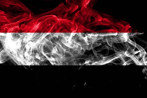 Yemen smoke flag isolated on black background — Stok fotoğraf