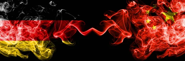 Germany vs China, Chinese smoky mystic flags placed side by side. Thick colored silky smoke flags of Deutschland and China, Chinese — Stock Photo, Image