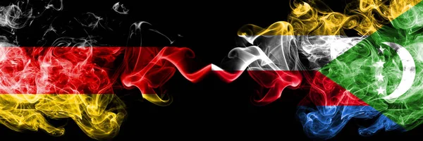 Germany vs Comoros, Comorian smoky mystic flags placed side by side. Thick colored silky smoke flags of Deutschland and Comoros, Comorian — Stock Photo, Image