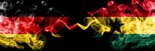 Germany vs Ghana, Ghanaian smoky mystic flags placed side by side. Thick colored silky smoke flags of Deutschland and Ghana, Ghanaian.