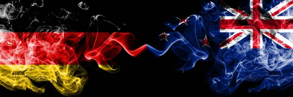 Germany vs New Zealand, New Zealander smoky mystic flags placed side by side. Thick colored silky smoke flags of Deutschland and New Zealand, New Zealander — Stock Photo, Image