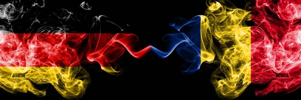 Germany vs Romania, Romanian smoky mystic flags placed side by side. Thick colored silky smoke flags of Deutschland and Romania, Romanian — Stock Photo, Image