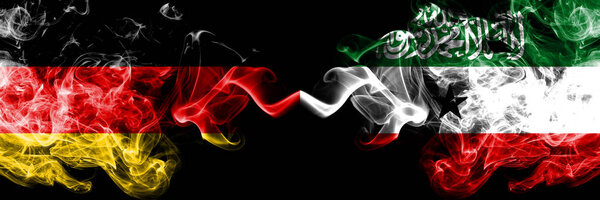 Germany vs Somaliland smoky mystic flags placed side by side. Thick colored silky smoke flags of Deutschland and Somaliland.