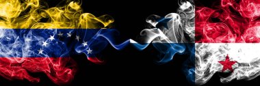 Venezuela vs Panama dumanlı mistik bayraklar yan yana yerleştirilir. Venezuela ve Panama kalın renkli ipeksi duman bayrakları