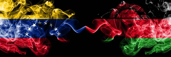 Venezuela vs Malawi, Malawian smoky mystic flags placed side by side. Thick colored silky smoke flags of Venezuela and Malawi, Malawian — Stock Photo, Image
