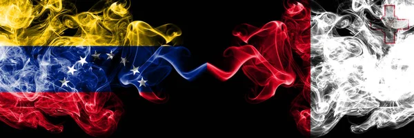 Venezuela vs Malta, Maltese smoky mystic flags placed side by side. Thick colored silky smoke flags of Venezuela and Malta, Maltese — Stock Photo, Image
