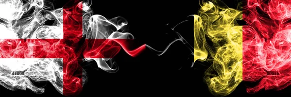 Angol vs Belgium, belga füstös misztikus zászlók elhelyezett egymás mellett. Vastag színes selymes dohányos zászló Anglia és Belgium, a belga. — Stock Fotó