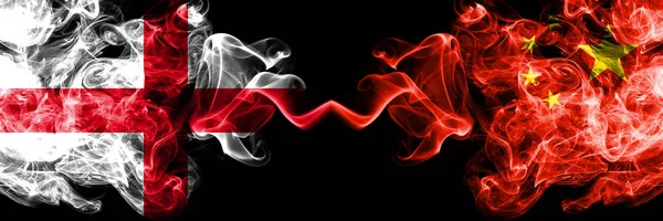 English vs China, Chinese smoky mystic flags placed side by side. Thick colored silky smokes flag of England and China, Chinese. — Stock Photo, Image