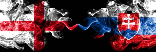 Russian vs Slovakia, Slovakian smoky mystic flags placed side by side. Толстый шелковистый курит флаг Англии и Словакии, словацкий . — стоковое фото