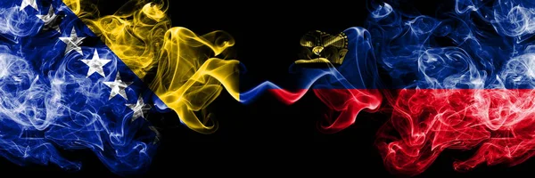 Bosnia and Herzegovina, Bosnian, Liechtenstein competition thick colorful smoky flags. European football qualifications games — Stock Photo, Image