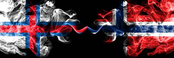 Faroe Islands, Norway, Norwegian competition thick colorful smoky flags. European football qualifications games — Stock Photo, Image