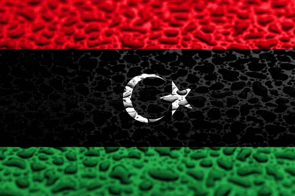Líbia nemzeti zászlója vízcseppből készült. Háttér-előrejelzési koncepció. — Stock Fotó