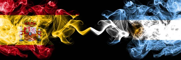 Spain vs Argentina, Argentinian smoky mystic flags placed side by side. Thick colored silky smokes flag of Spanish and Argentina, Argentinian — Stock Photo, Image
