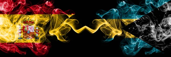 Spain vs Bahamas, Bahamian smoky mystic flags placed side by side. Thick colored silky smokes flag of Spanish and Bahamas, Bahamian — Stock Photo, Image