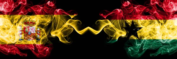 Spain vs Ghana, Ghanaian smoky mystic flags placed side by side. Thick colored silky smokes flag of Spanish and Ghana, Ghanaian — Stock Photo, Image