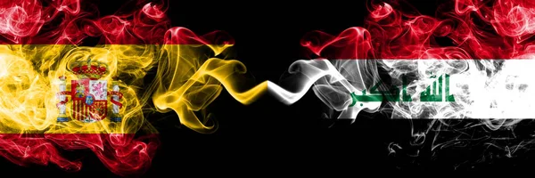 Spain vs Iraq, Iraqi smoky mystic flags placed side by side. Thick colored silky smokes flag of Spanish and Iraq, Iraqi — Stock Photo, Image