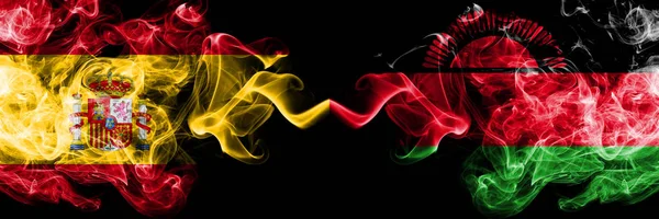 Spain vs Malawi, Malawian smoky mystic flags placed side by side. Thick colored silky smokes flag of Spanish and Malawi, Malawian — Stock Photo, Image