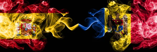 Spain vs Moldova, Moldovan smoky mystic flags placed side by side. Thick colored silky smokes flag of Spanish and Moldova, Moldovan — Stock Photo, Image