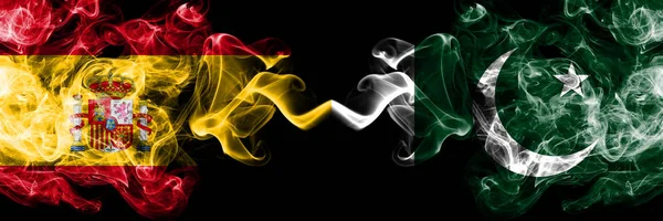 Spain vs Pakistan, Pakistani smoky mystic flags placed side by side. Thick colored silky smokes flag of Spanish and Pakistan, Pakistani — Stock Photo, Image