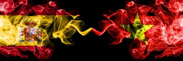 Spain vs Vietnam, Vietnamese smoky mystic flags placed side by side. Thick colored silky smokes flag of Spanish and Vietnam, Vietnamese — Stock Photo, Image