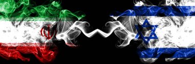 İran vs İsrail, İsrail dumanlı mistik devletler bayrakları yan yana yerleştirilir. Kalın renkli ipeksi İran ve İsrail, İsrail bayrak kombinasyonu dumanlar