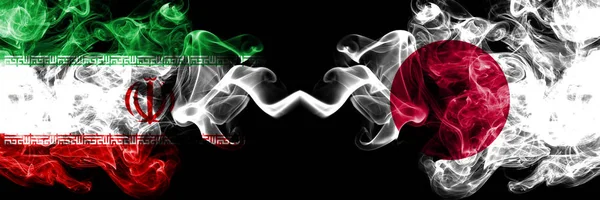 Iran vs Japan, Japanese smoky mystic states flags placed side by side. Thick colored silky smokes flag combination of Iranian and Japan, Japanese — Stock Photo, Image