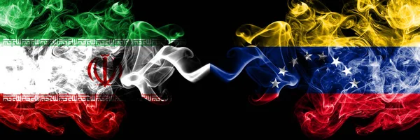 Iran vs Venezuela, Venezuelan smoky mystic states flags placed side by side. Thick colored silky smokes flag combination of Iranian and Venezuela, Venezuelan — Stock Photo, Image