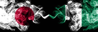 Japonya vs Nijerya, Nijerya dumanlı mistik bayraklar yan yana yerleştirilir. Nijerya, Nijerya ve Japon bayrağının kalın renkli ipeksi dumanları