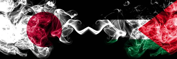 Japan vs Palestine, Palestinian smoky mystic flags placed side by side. Thick colored silky smokes combination of Palestine, Palestinian and Japanese flag — Stock Photo, Image