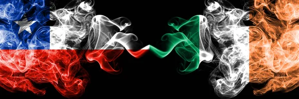 Chile vs Ireland, Irish smoky mystic flags placed side by side. Thick colored silky smokes combination of Ireland, Irish and Chilean flag — Stock Photo, Image