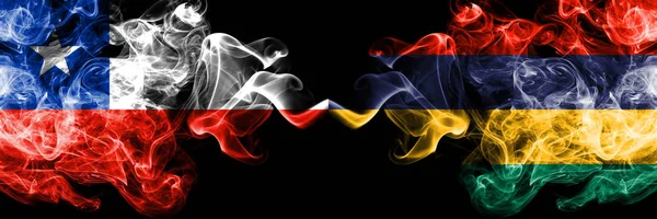 Chile vs Mauritius, Mauritian smoky mystic flags placed side by side. Thick colored silky smokes combination of Mauritius, Mauritian and Chilean flag — Stock Photo, Image