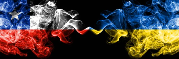 Chile vs Ukraine, Ukrainian smoky mystic flags placed side by side. Thick colored silky smokes combination of Ukraine, Ukrainian and Chilean flag — Stock Photo, Image